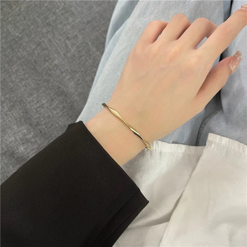 Women's Golden Charm Bangle – Minimalist Twisted Cuff Bracelet, Trendy Wedding & Gift Jewelry