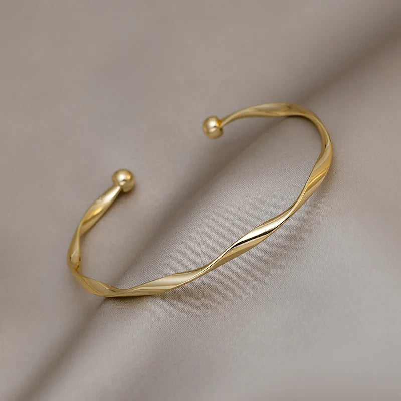 Women's Golden Charm Bangle – Minimalist Twisted Cuff Bracelet, Trendy Wedding & Gift Jewelry